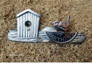 Brosche mit Vogel aus Quarter farthing