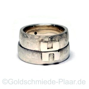 Trauringe aus Silber mit Belötungen aus Gold und Silber